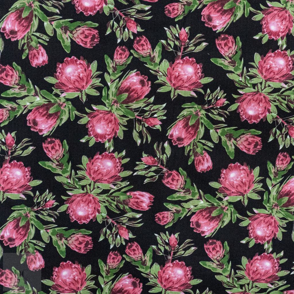 115PPC5F242231.jpg 115CM PRINTED POLY COTTON SMALL PROTEA BLACK - Image 1